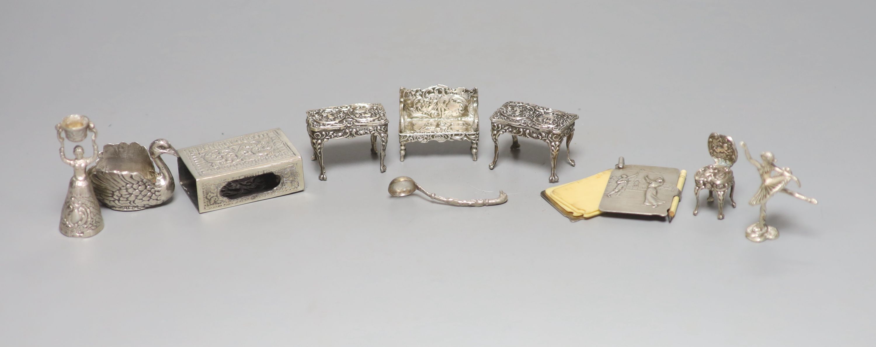 An Edwardian miniature silver model of a settee, two later chairs and a table and five other items, including aide memoire.
